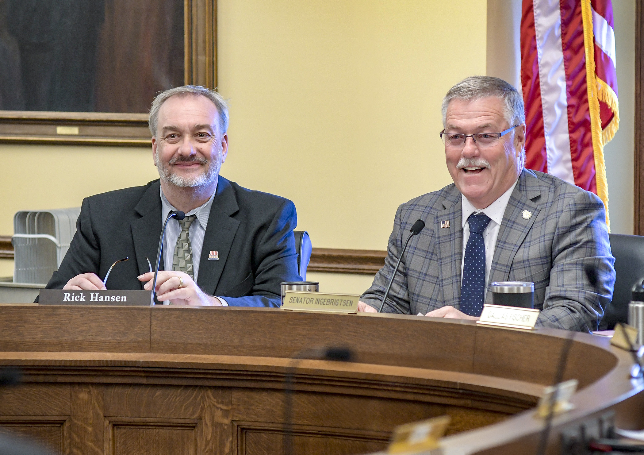 Rep. Rick Hansen, left, and Sen. Bill Ingebrigtsen listen to member introductions May 7 at the first conference committee meeting on the omnibus environment and natural resources finance bill. Photo by Andrew VonBank